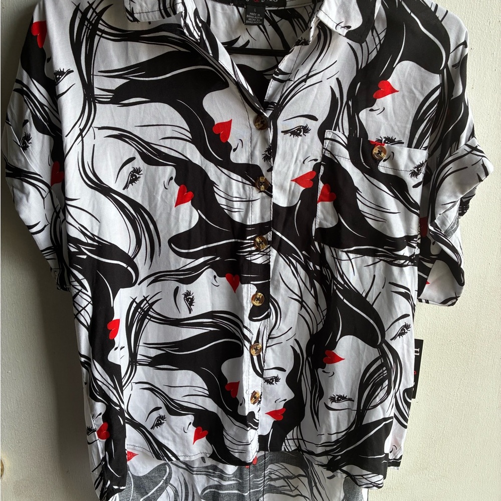 Stylish Black and White Women's Top with Red Accents